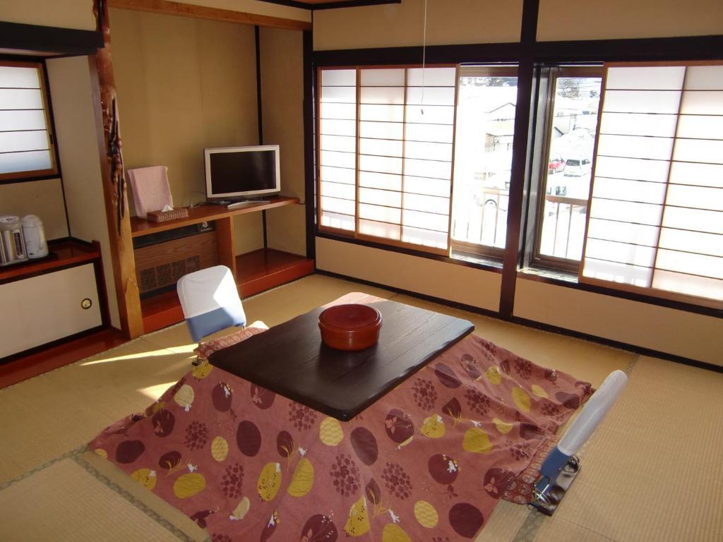 Готель Kikusuisou Annex Кусацу Номер фото