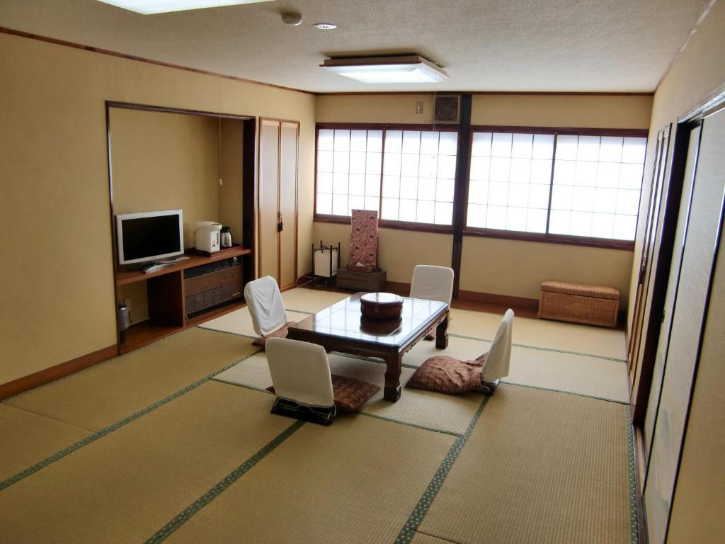 Готель Kikusuisou Annex Кусацу Номер фото