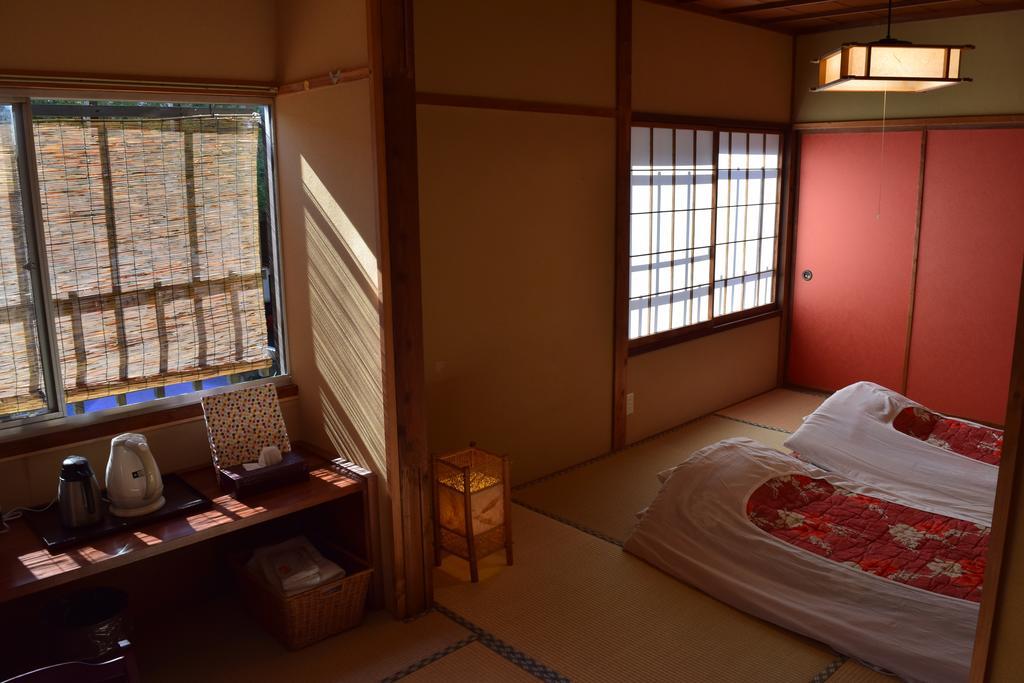 Готель Kikusuisou Annex Кусацу Номер фото