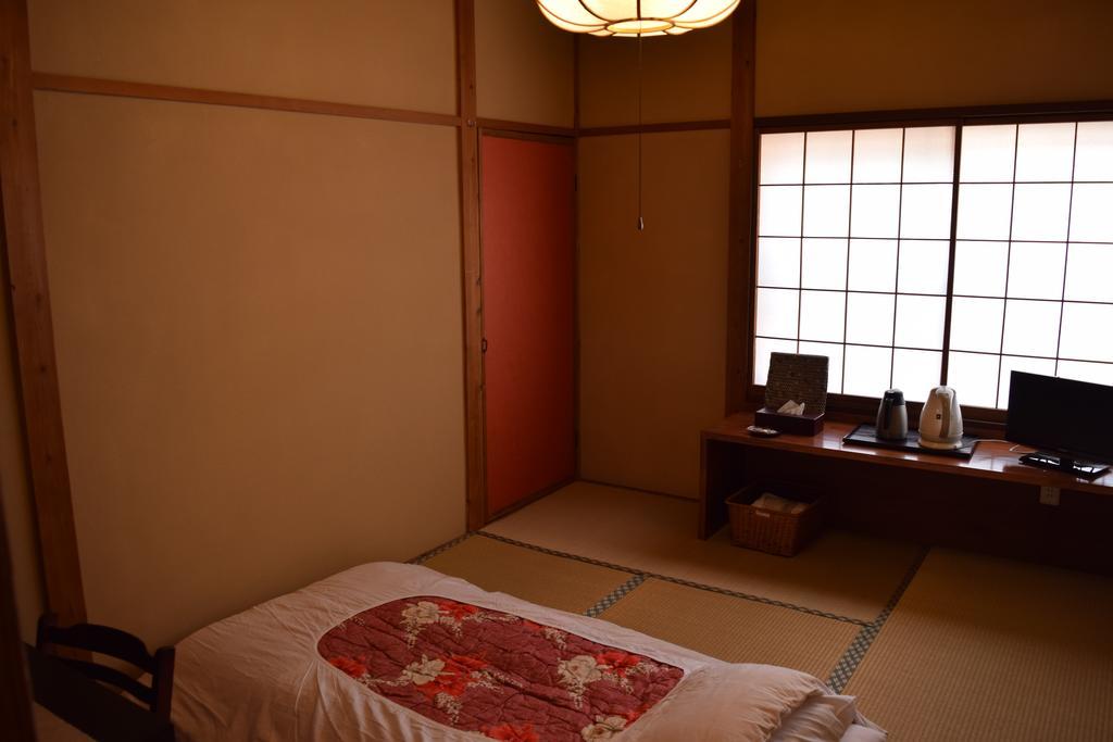 Готель Kikusuisou Annex Кусацу Номер фото